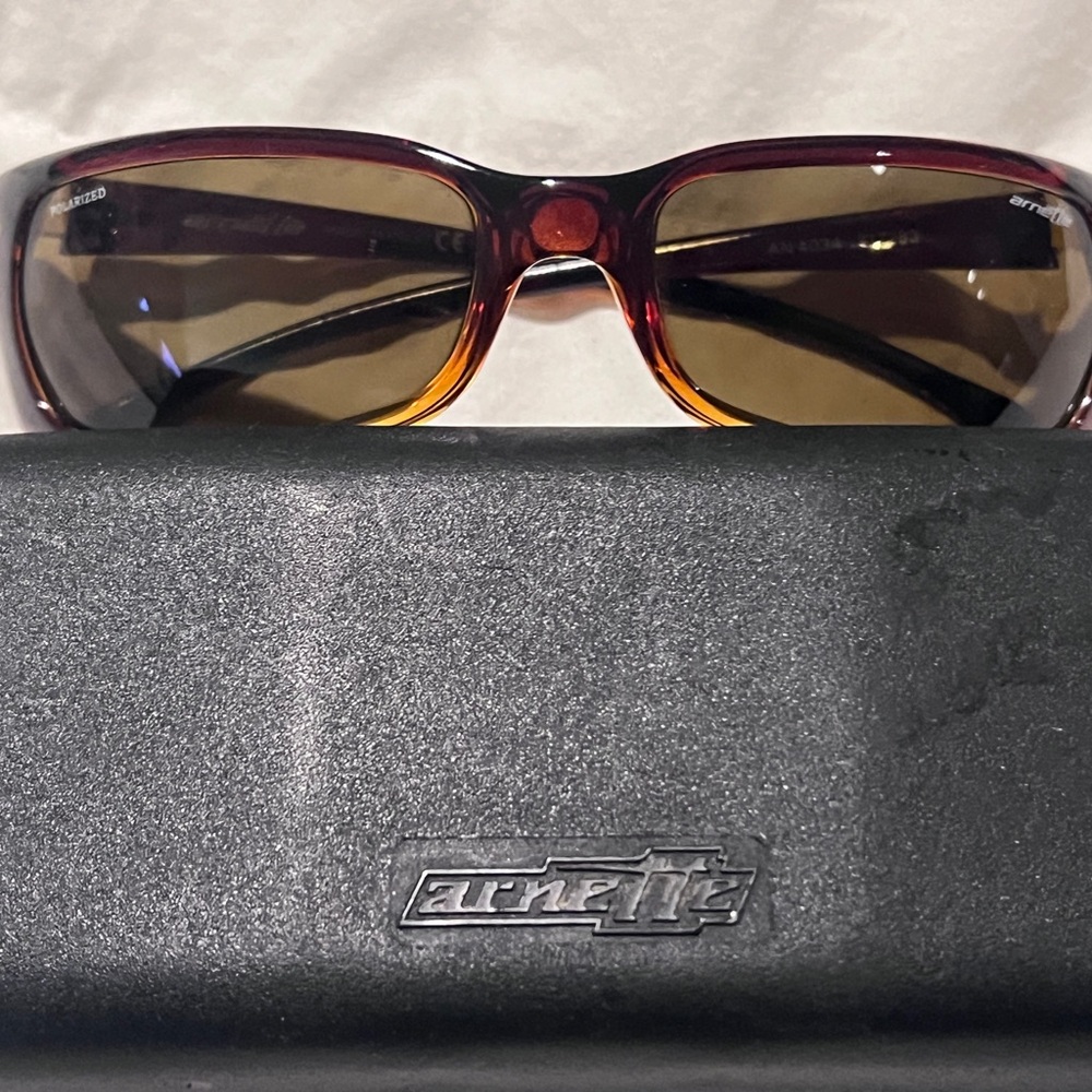 Arnette Polacized Red and Brown Sunglasses with Black Case